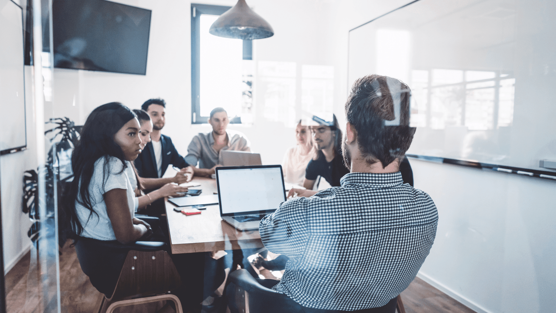 Leader Asking Ice Breaker Questions in Meeting