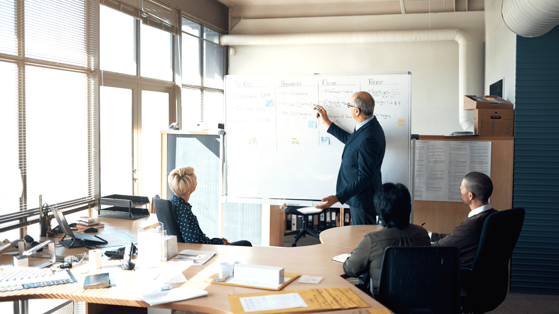 Transparent leader talking to employees at work